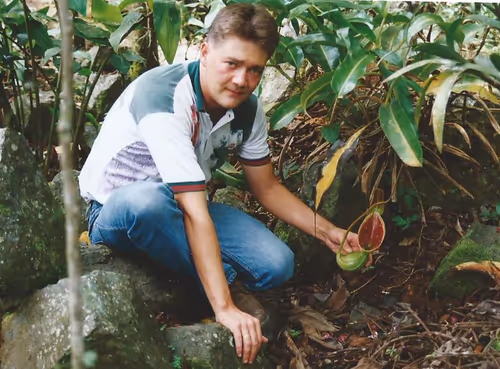 06. Matt with Nepenthes lowii on Mount Kinabalu, Borneo