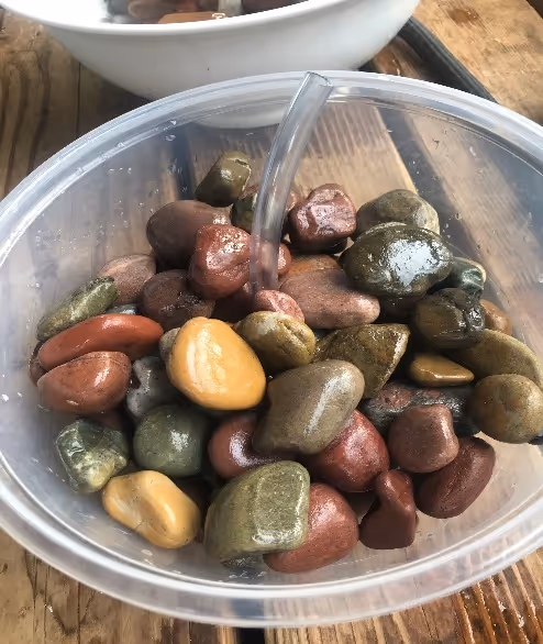 The pump hidden with rocks