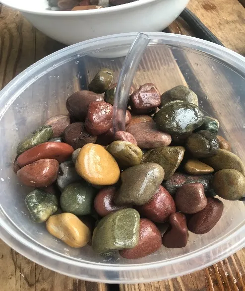 The pump hidden with rocks