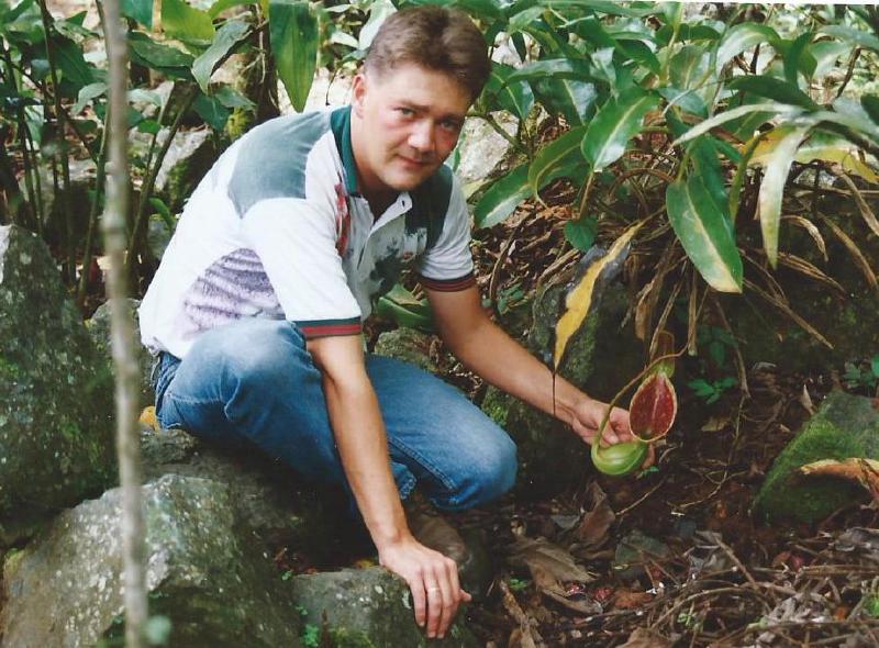 Matt with Nepenthes lowii on Mount Kinabalu, Borneo.