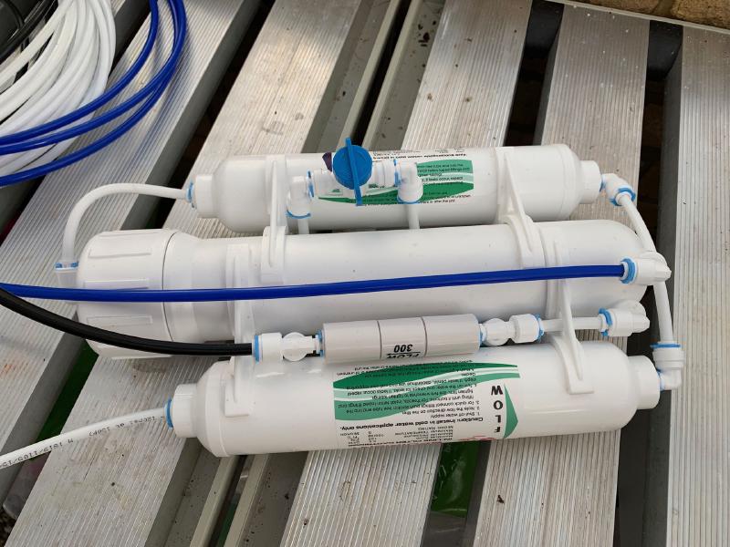 My three-stage reverse osmosis unit. This one comes with generous lengths of 1/4 inch tubing.